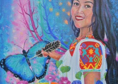 Pintura de Autoretrato de artista Nahua Norma Martinez. Norma esta pintando una mariposa azul al mismo tiempo que es parte de la pintura